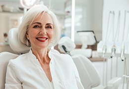 Elegant older woman in dental treatment chair