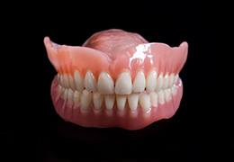 Set of full dentures for upper and lower arches