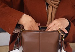 Woman searching her purse