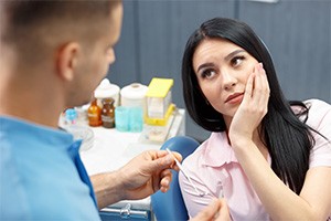 Patient experiencing dental emergency